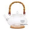 Изображение Чайник стеклянный "Душистая кувшинка" с заварочной колбой,пробковой подставкой, бамбуковой ручкой и пружинкой-фильтром в носике, 1 л., дно d80 мм.
